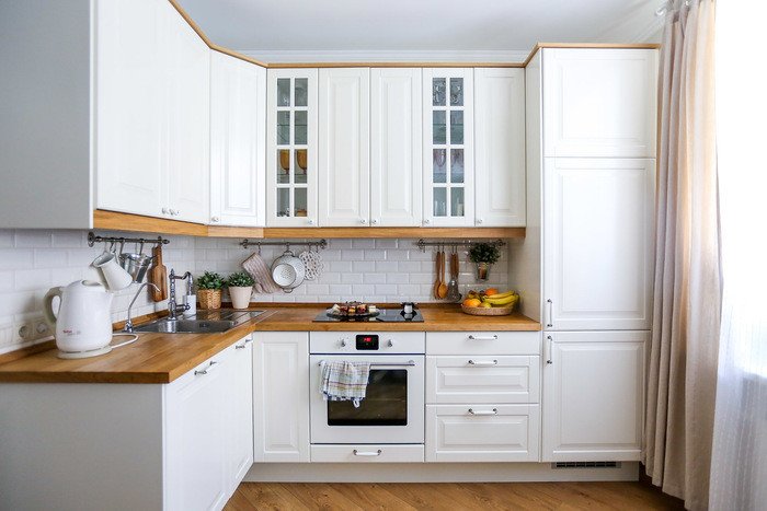 Белые кухонные комплекты в интерьере